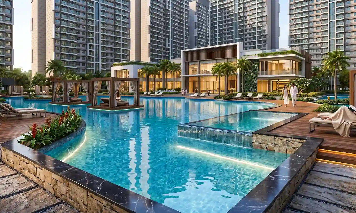 Clubhouse pool deck with cabanas and sun loungers